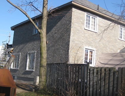 reface house with stone Ajax